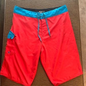 EUC Fox board shorts size 32 red blue
